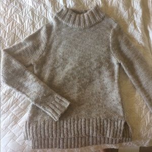 Tan turtleneck sweater